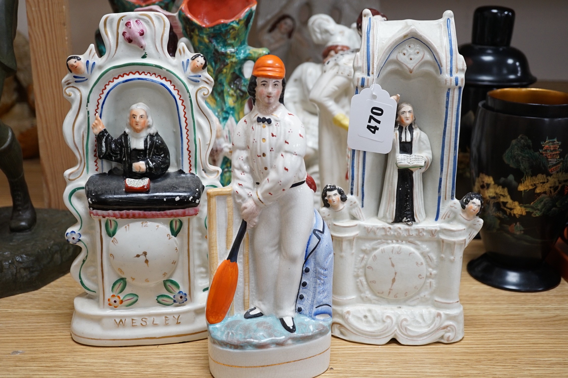 Staffordshire pottery to include - a pair of flat back spill vase, two John Wesley flat backs, four other flat backs and a reproduction cricketer, tallest 36 cm